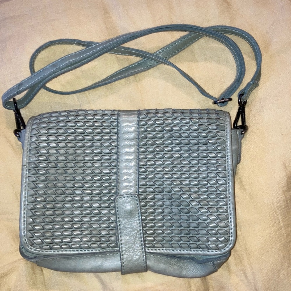 Pale blue leather strap bag